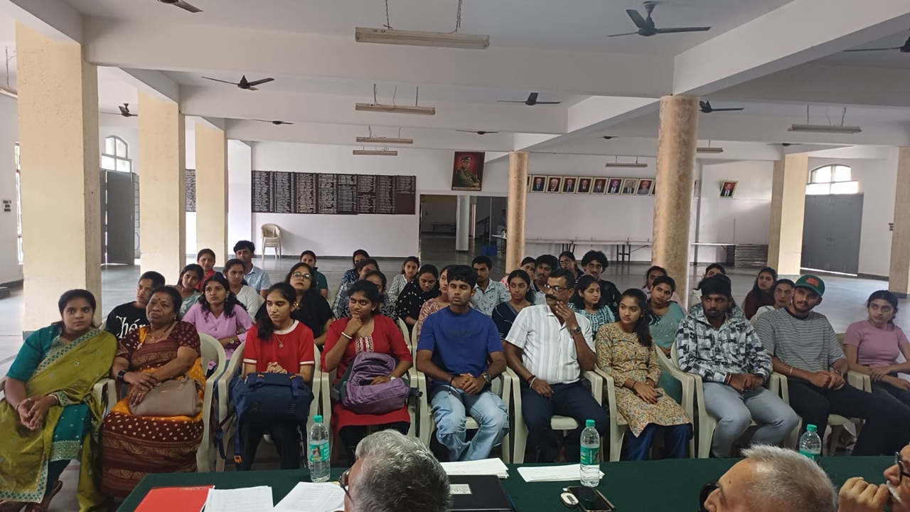 Scholarship beneficiaries and their parents on the eve of handing over cheques on 26012026 at Kodava Samaja, Mysore.